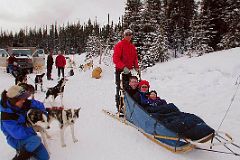 03 Jerome Ryan, Charlotte Ryan and Peter Ryan Taking A Dogsled Tour n The Winter Next To The Road Between Lake Louise Village And Lake Louise In Winter.jpg